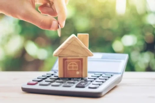 Service charges leasehold property — flat owner reviewing annual service charge statement with breakdown of building costs