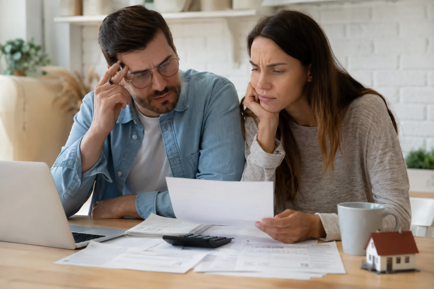 Couple budgeting to avoid hidden conveyancing costs